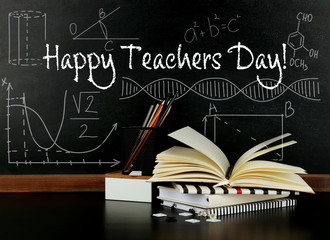 Teachers day concept. Text on chalkboard