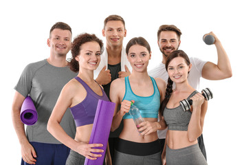 Group of sportive people on white background
