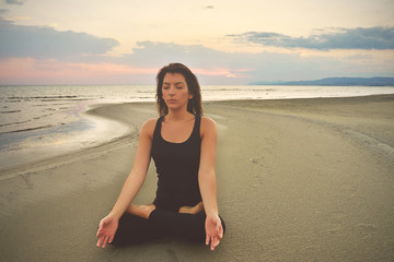 Fototapeta na wymiar Woman practicing yoga in various poses (asana)