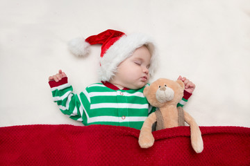 sleeping baby girl Santa Claus. Cute Baby - Christmas

