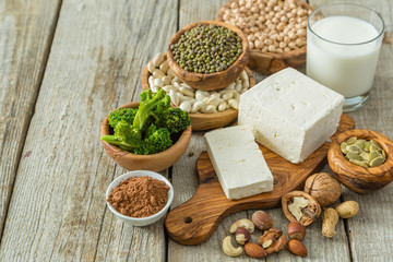 Selection vegan protein sources on wood background