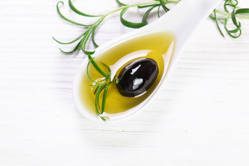 Fototapeta premium Oils on vintage wooden background . healthy food