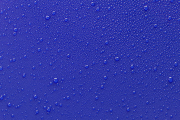 Drops of water on a blue background.