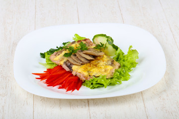 Pork steak with mushroom and cheese