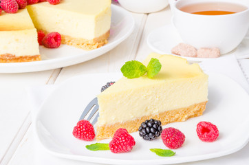 Delicious cheesecake with raspberries and blackberries