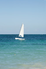 Obraz premium Sailing boat - a catamaran in the Atlantic Ocean