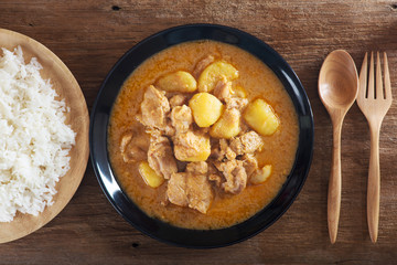 curry sauce and rice on a plate.