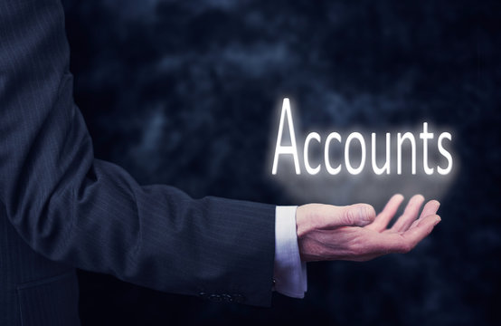 Businessman holding a Accounts Concept