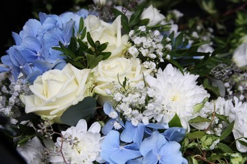 Flowers in a bouquet, Blue hydrangeas. Wedding car decorated with flowers