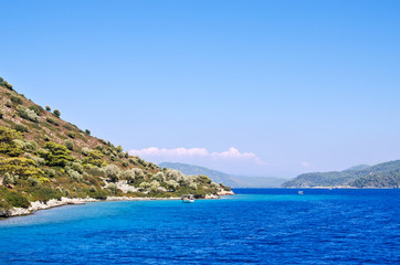 Fototapeta premium Small Pleasure boats off the coast of the Aegean islands