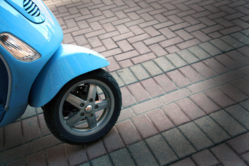 A fragment of a retro scooter