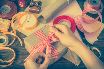 Christmas gift box, wrapping present with old paper and ribbon