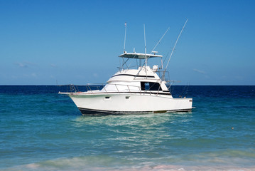 Fototapeta premium pleasure yacht anchored off the coast of the Dominican Republic. ocean tropical