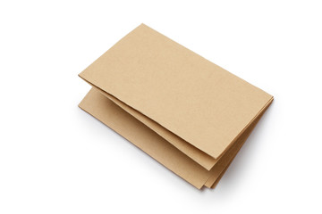 Folded brown paper isolated on white background