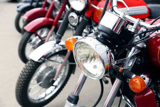 A fragment of a classic motorcycle with elements of chrome