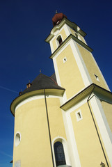 Obraz premium Clocher de l'église Heiliges Kreuz de Going am Wilden Kaiser