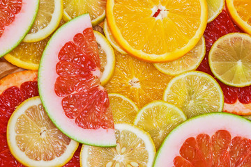 Juicy bright citrus fruit for natural background, vitamins and healthy eating concept