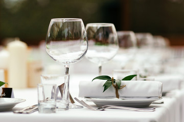 The decor at the wedding. Table setting rustic.