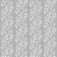 Seamless pattern with white flowers on a gray background