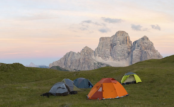 Italy, Dolomites, view to monte Pelmo with camp in the foreground by sunset
