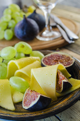 cheese with figs and grapes