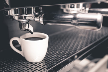 cup of coffee with professional coffee machine  retro color