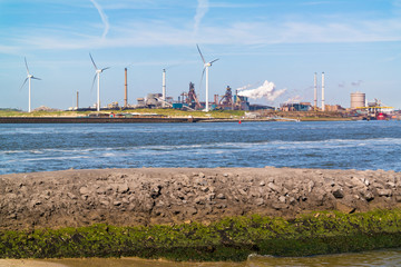 Fototapeta premium Steel making industry and North Sea Canal in seaport IJmuiden near Amsterdam, Netherlands