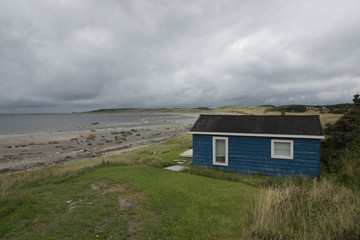 Fototapeta na wymiar House at coast, Sally's Cove, Gros Morne National Park, Newfound