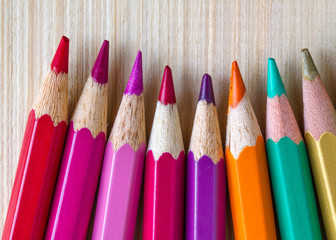 coloured pencil on the wood floor.