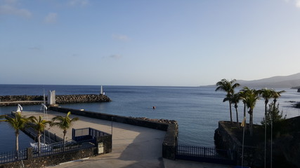 Fototapeta na wymiar Beautiful coast and harbor of the Canary Island of Lanzarote