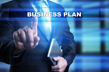 Businessman is pressing button on touch screen interface and selecting 