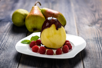 homemade dessert - pear with raspberries