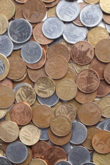 Piles of brazilian coins (money) on white background