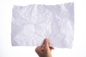 Hand's holding crumpled paper