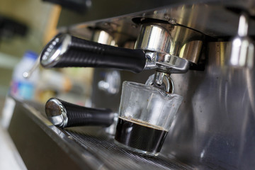 coffee making process from coffee machine in cafe shop