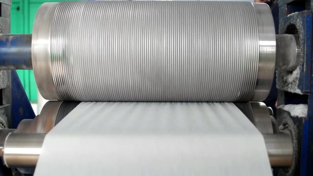 embossing pattern on napkins. plant for the production of napkins. shaft which pushes a relief pattern on paper. line for the production of paper napkins