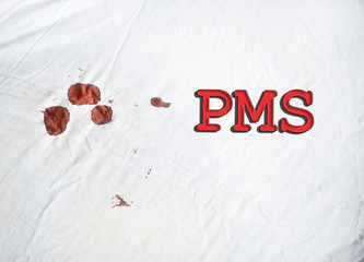 PMS sign on white sheet with blood