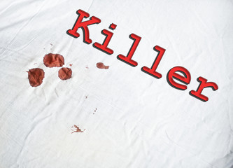 killer sign on white sheet with blood