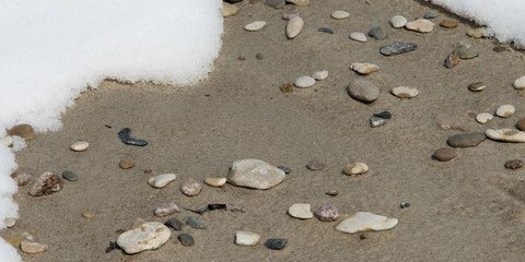 Fototapeta na wymiar Pebbles on the beach, Riverton, Hecla Grindstone Provincial Park