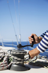 Man in action of pulling rope © BGStock72