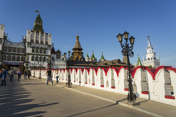 Tourists and people walking along the Izmailovo Kremlin in Mosco