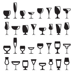 Collection of various drink glasses, icons set, black isolated on white background, vector illustration.