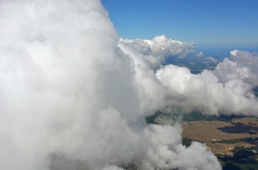 view into the horizon as the aircraft flies through the clouds, near the Georgian Bay, Ontario Canada 