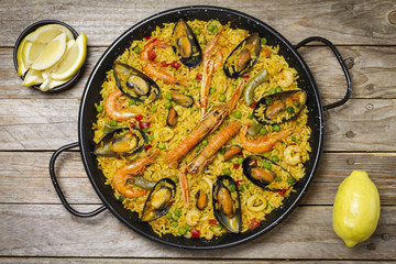 Spanish paella on a wooden table