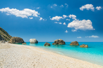 Megali Petra Beach, Lefkada Island, Greece. A beautiful beach with large rocks in the water.