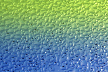 Water or dew drops on glass background