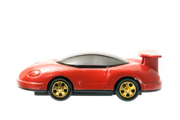 Toy red car / Toy red car on white background.