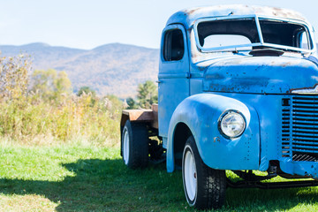 Classic blue truck without truck bed