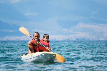 Father and son kayaking