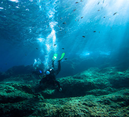 Divers, Mediterranean sea.